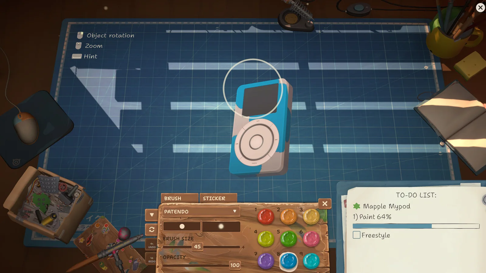 Music player on the ReStory repair mat with cleaning tools and a to-do list
